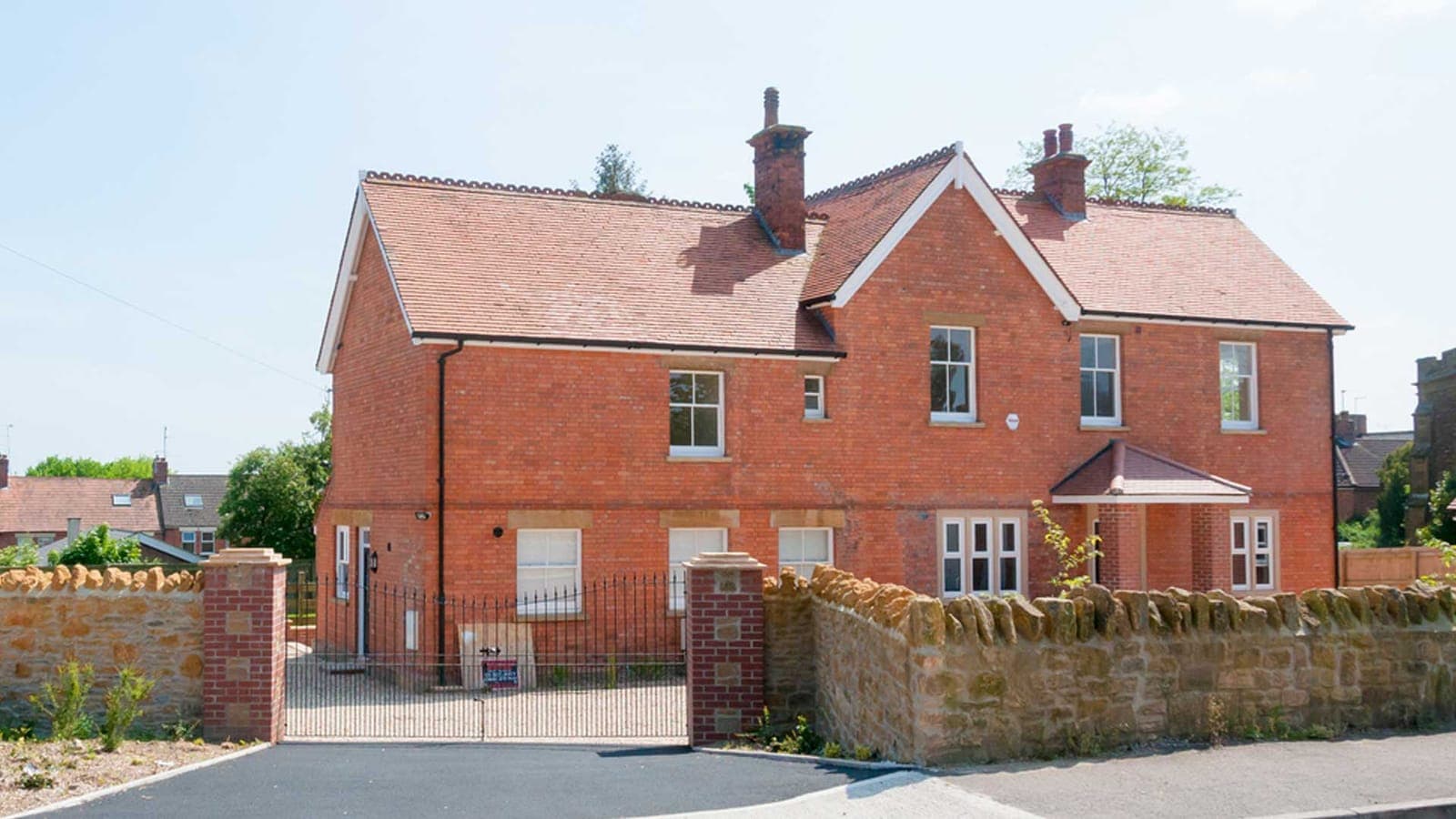 Substantial period brick property with restored frontage and boundary walls